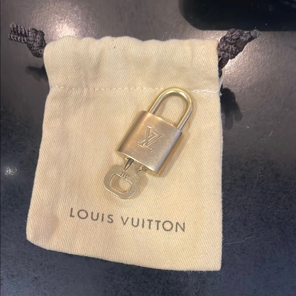 LV #311 Brass Lock/Key/Dustbag